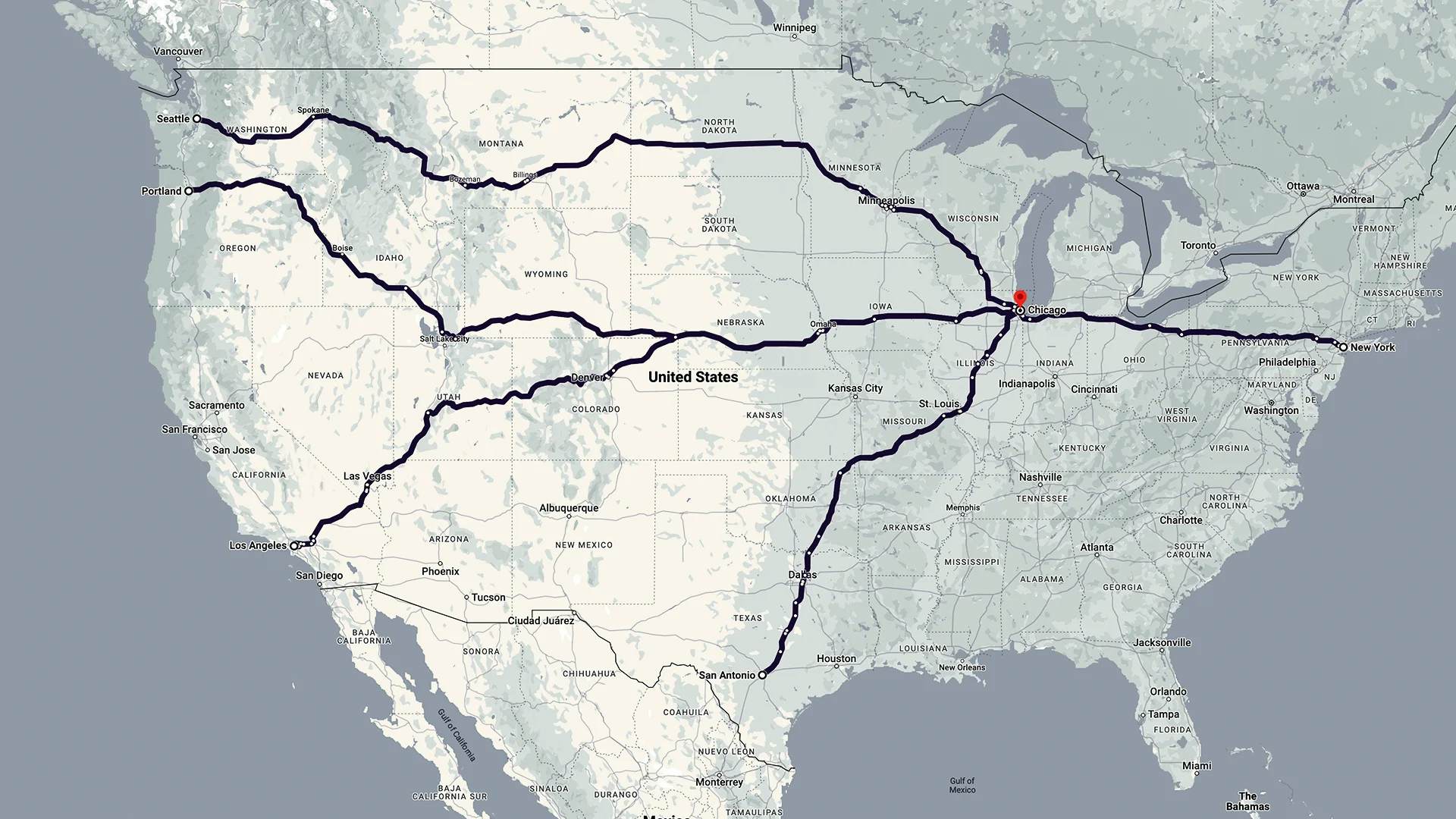 A detailed map of the United States displaying major transportation routes highlighted with a thick black line traversing various states, with a red dot marking Chicago. The map provides a visual representation of significant interstate connections used for logistics and travel across the country.